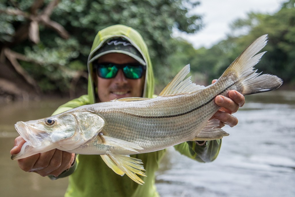 Angler with snook caught in Costa Rican river